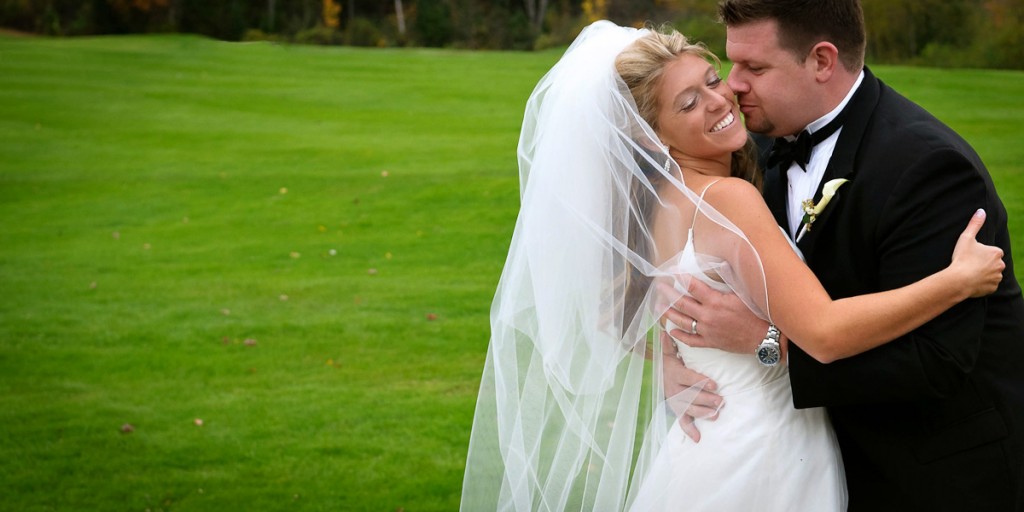 wedding couple kissing by Rick Bouthiette Photography