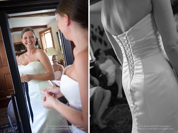 Bride in mirror, details of dress.