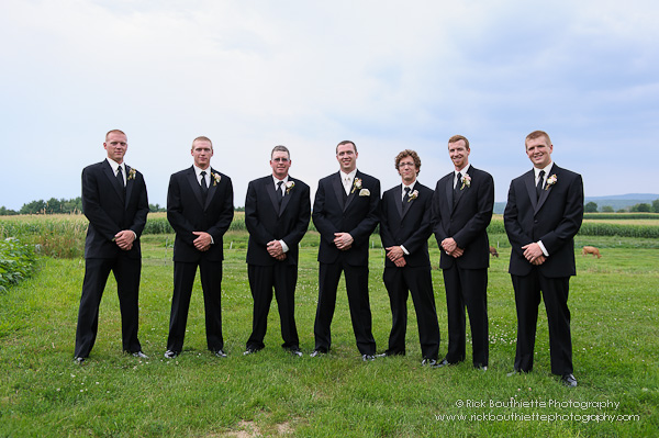 Groomsmen Standing in field