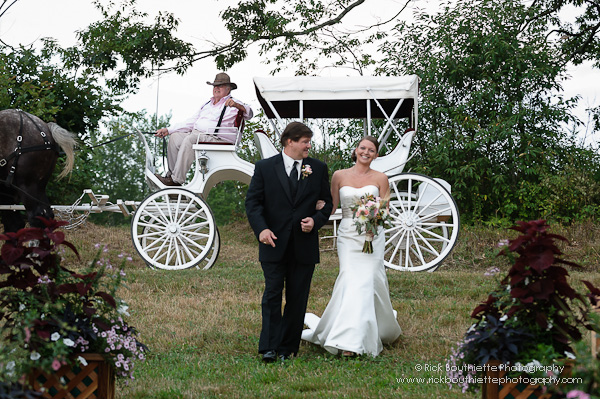 Bride & Father walk down aisle, carriage in background