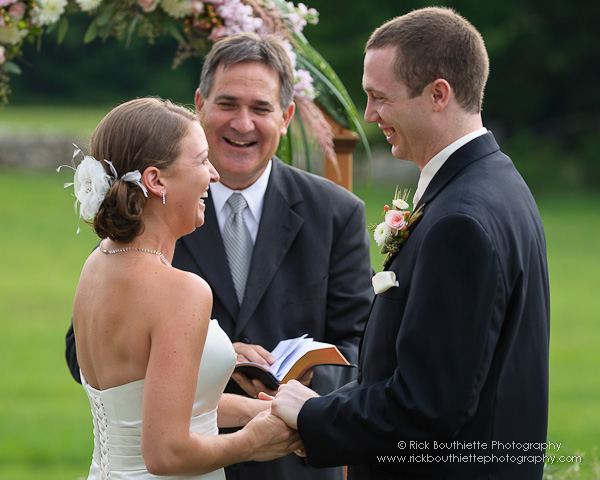 Bride & Groom laughing at wedding ceremony