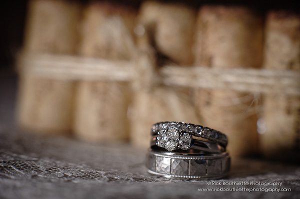 Wedding rings with corks in background, closeup