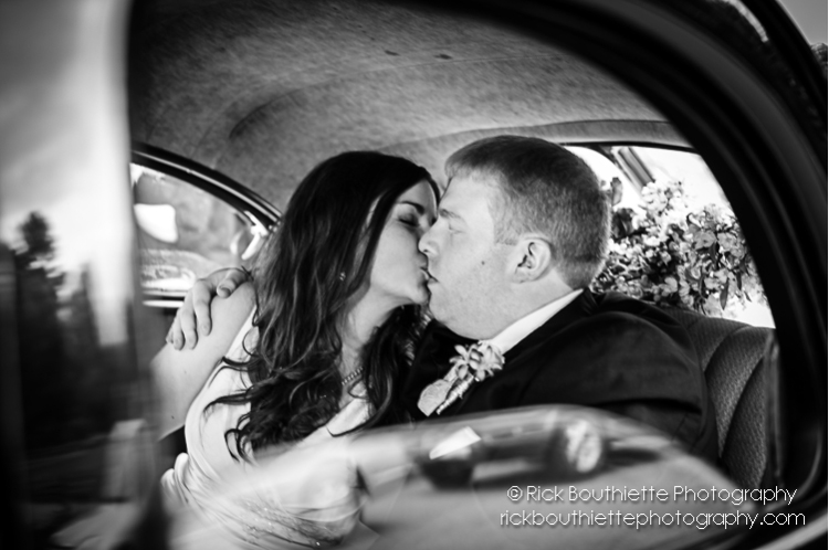 bride & groom kissing