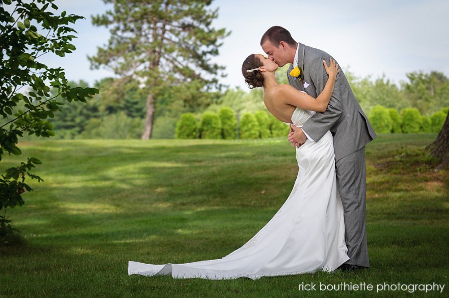 Bride and groom kissing at candia woods wedding