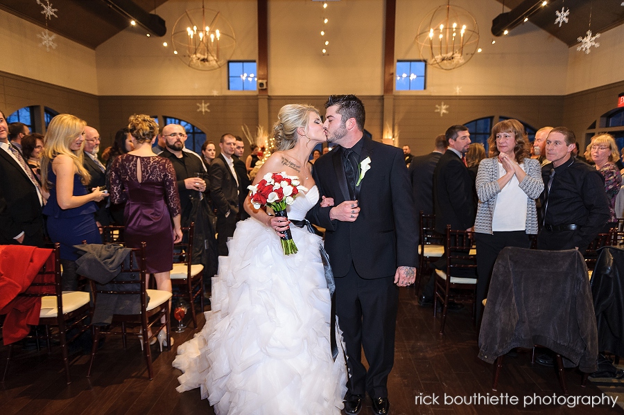 Bride and groom kiss after wedding ceremony at LaBelle Winery