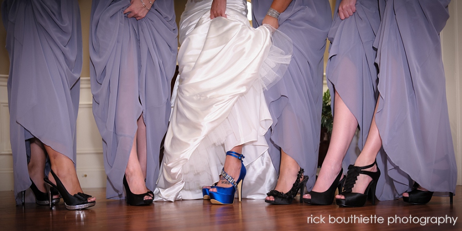 bride & bridesmaids showing off their shoes