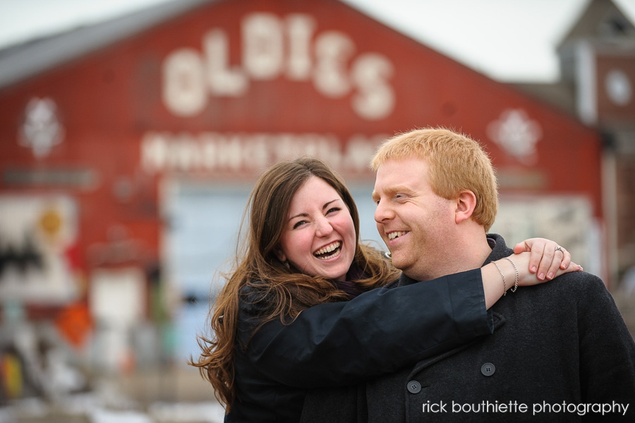 couple laughing and hugging during engagement session