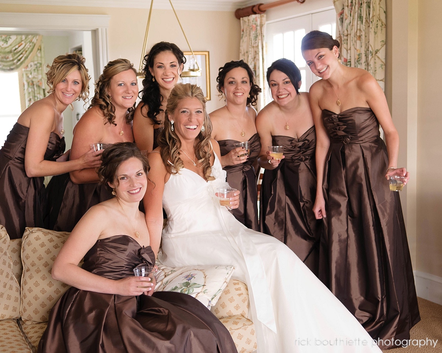 Bride & bridesmaids pose for a group picture