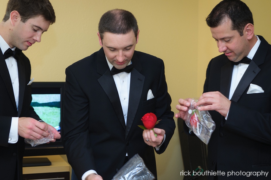 groomsmen pinning boutonneires