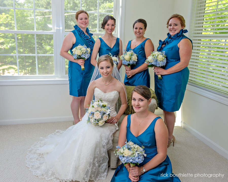 portrait of bride and her bridesmaids before blue ocean music hall wedding