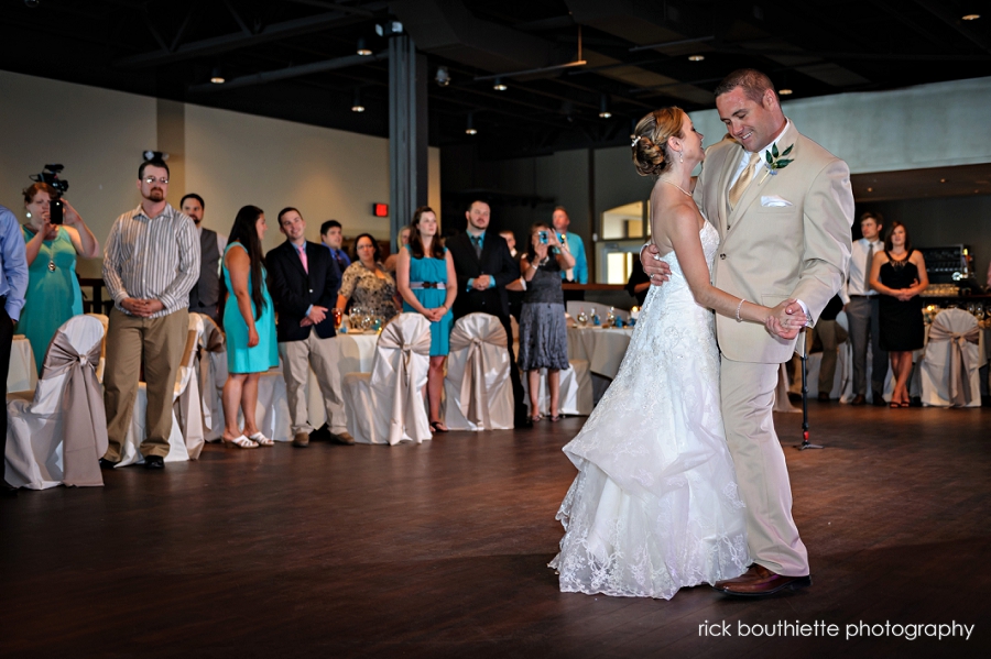 bride and groom have their first dance at their blue ocean music hall wedding