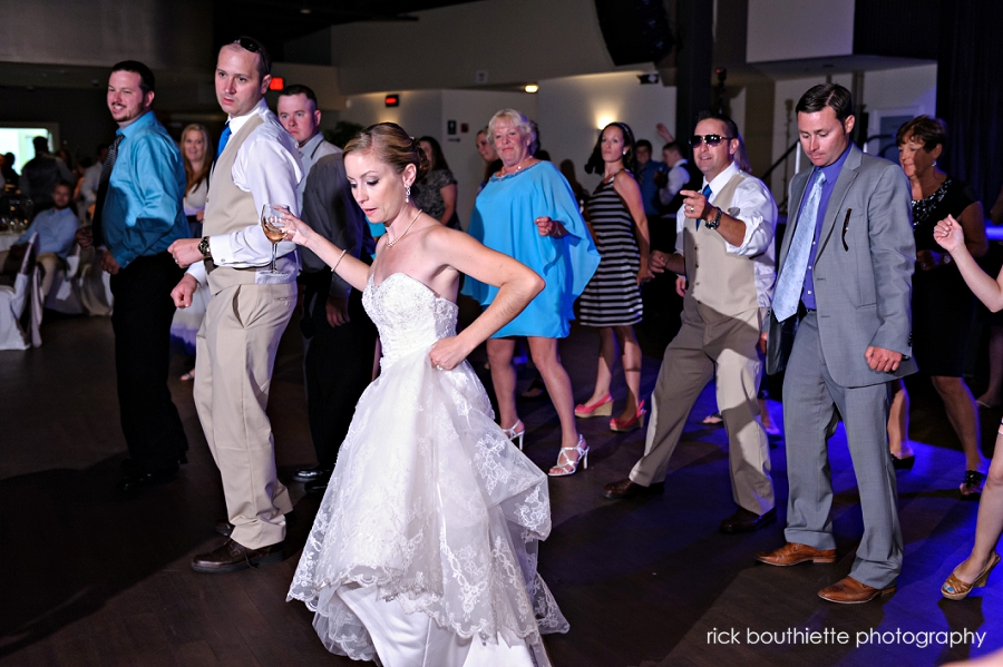 bride dancing with guests at her blue ocean music hall wedding