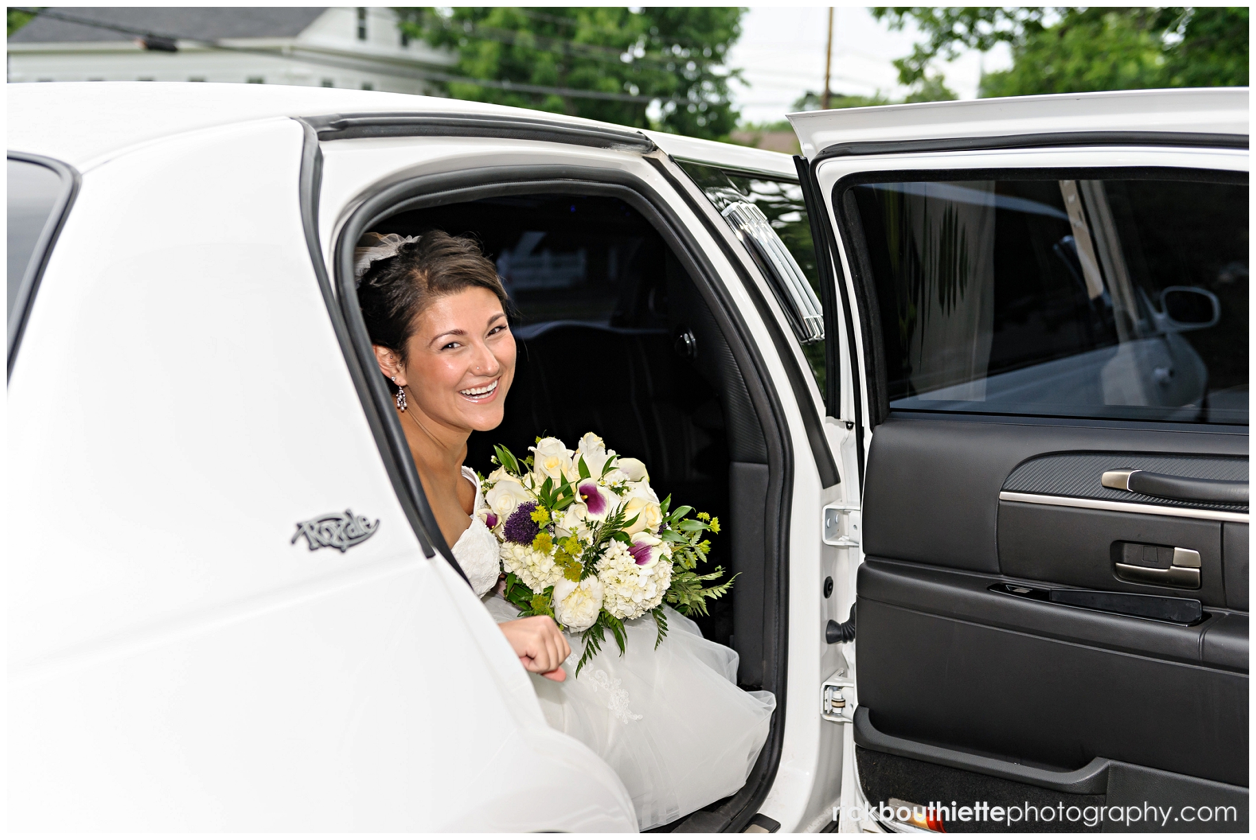 bride arrives in limousine