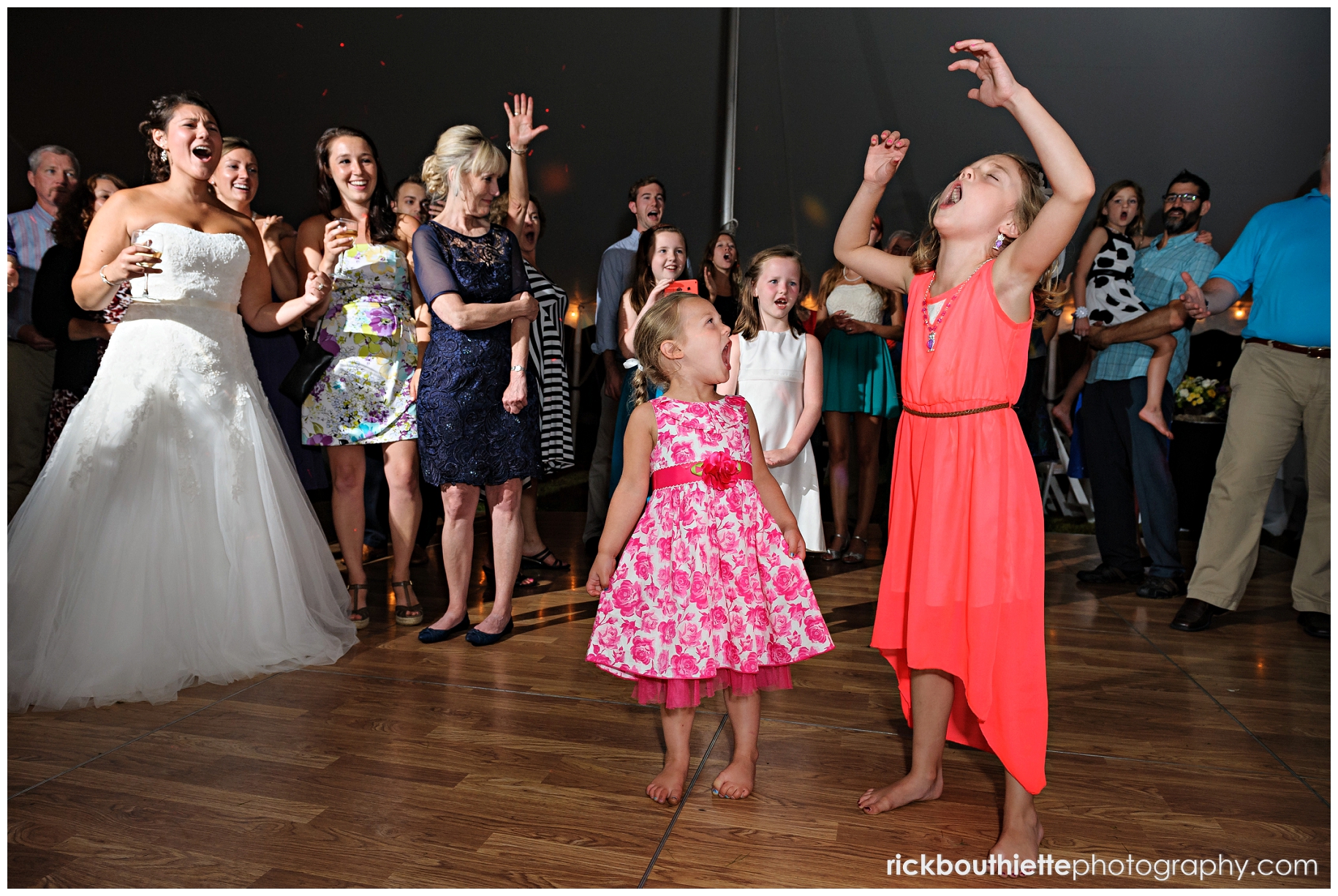 girls sinf Let It Go at wedding reception