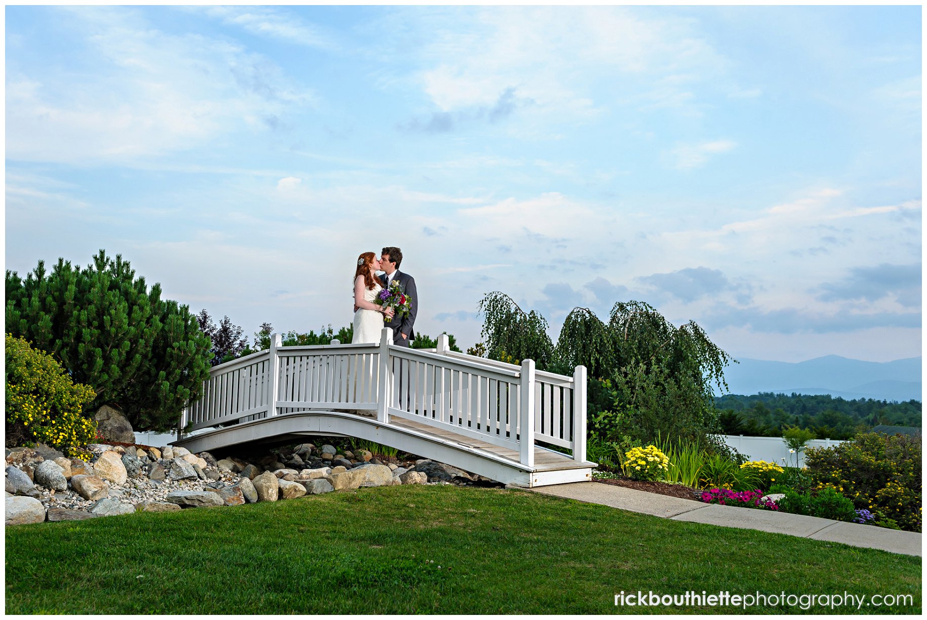 bride and groom on bridge overlooking the Grand Fountain Terrace