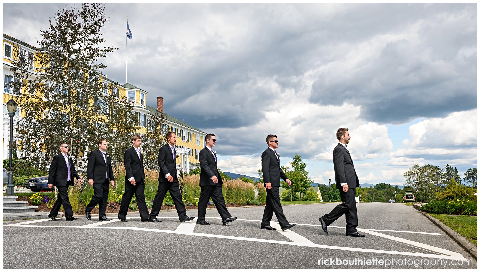groom and groomsmen simulate Abbey Road at Mountain View Grand