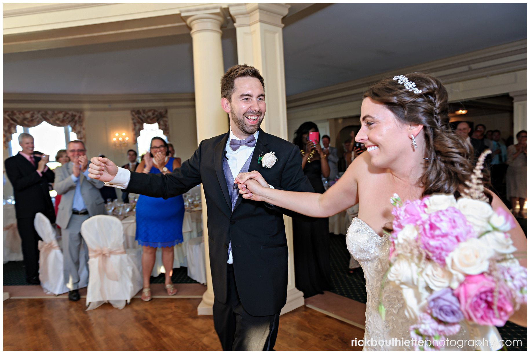 bride and groom enter the Crystal Ballroom at Mountain View Grand