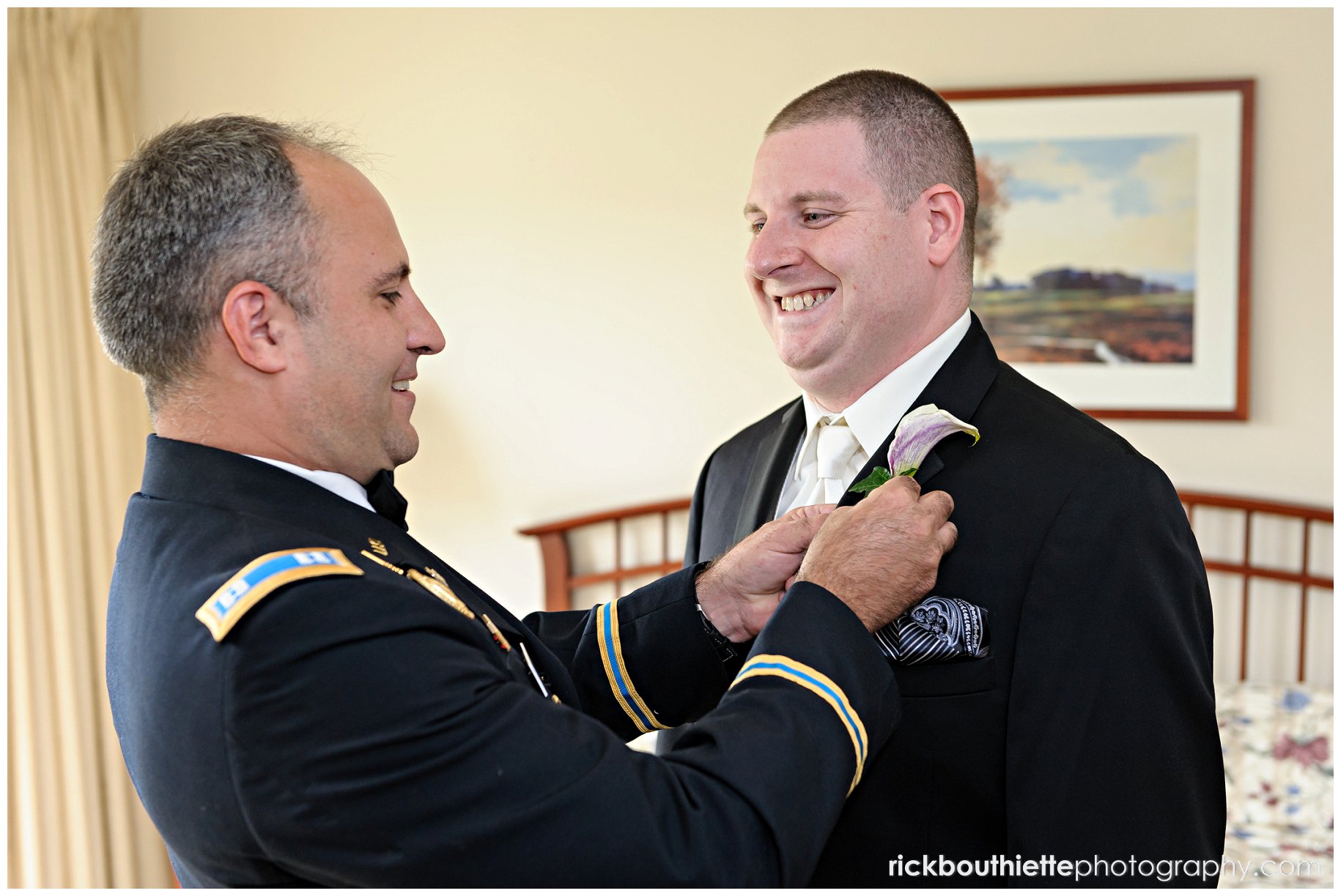 best man helps groom getting ready