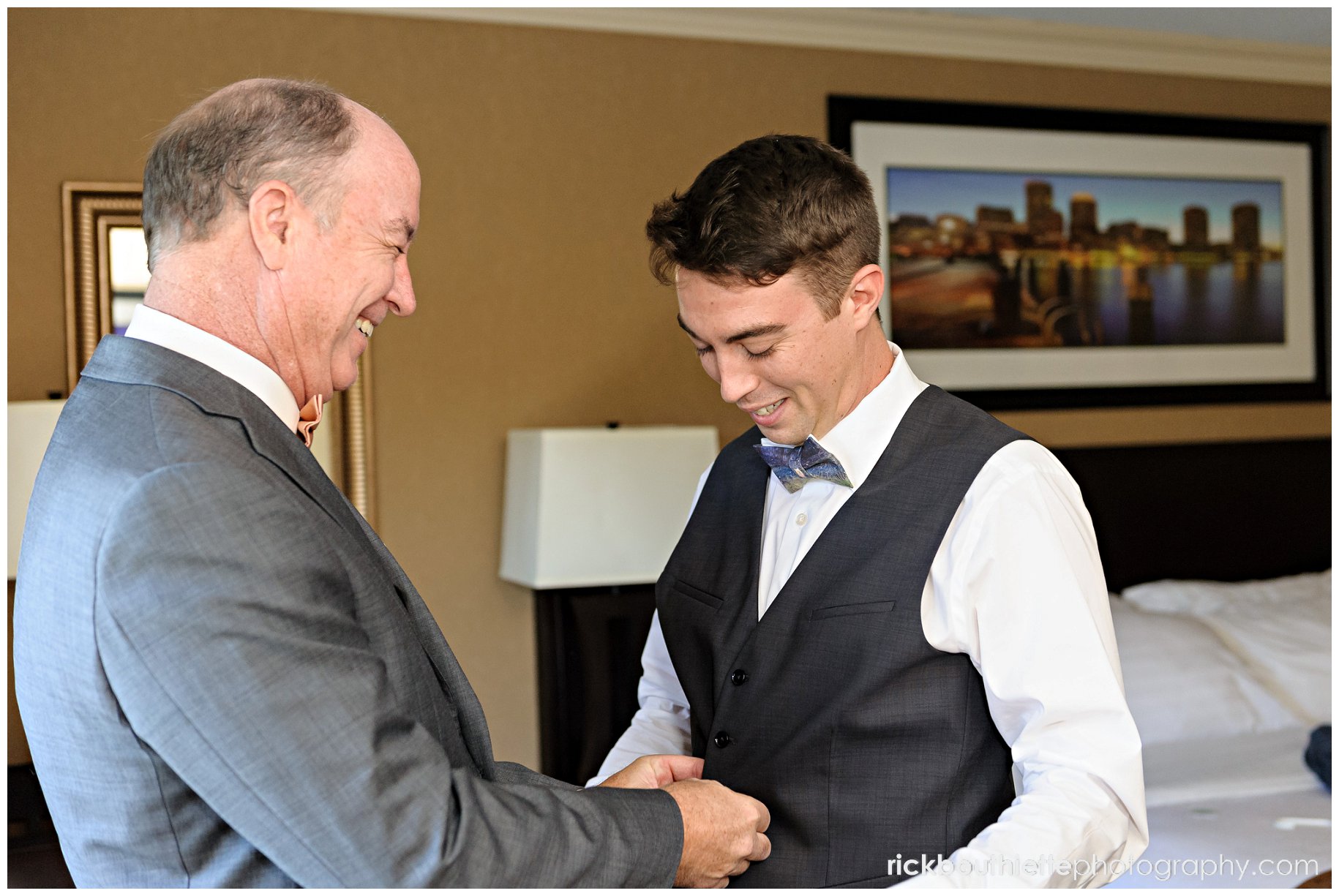 groom and father getting ready for wedding