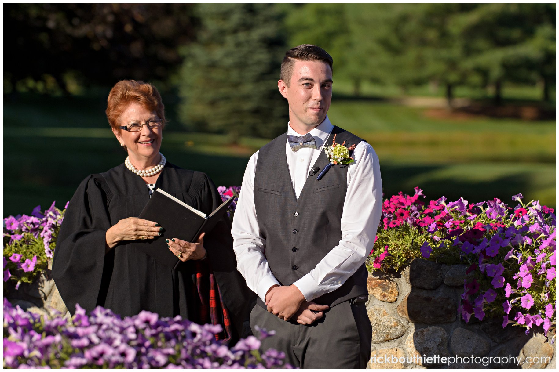 groom waits for his bride on the bridge at Tewksbury Country Club wedding