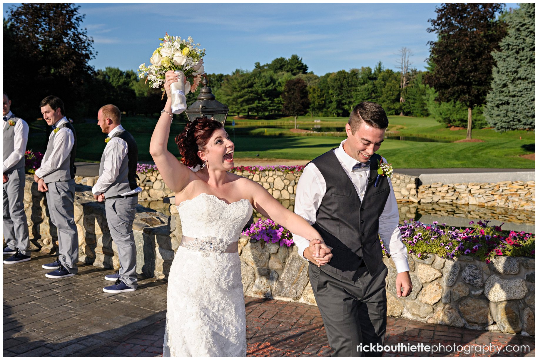 bride & groom celebrate as the leave ceremony at Tewksbury Country Club wedding