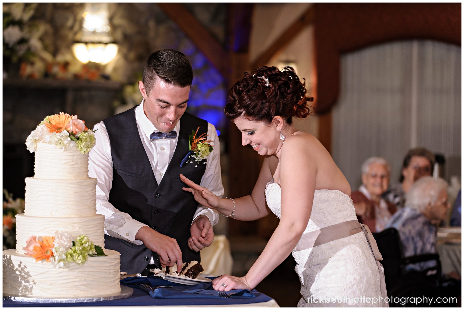 bride & groom cut the cake at Tewksbury Country Club wedding