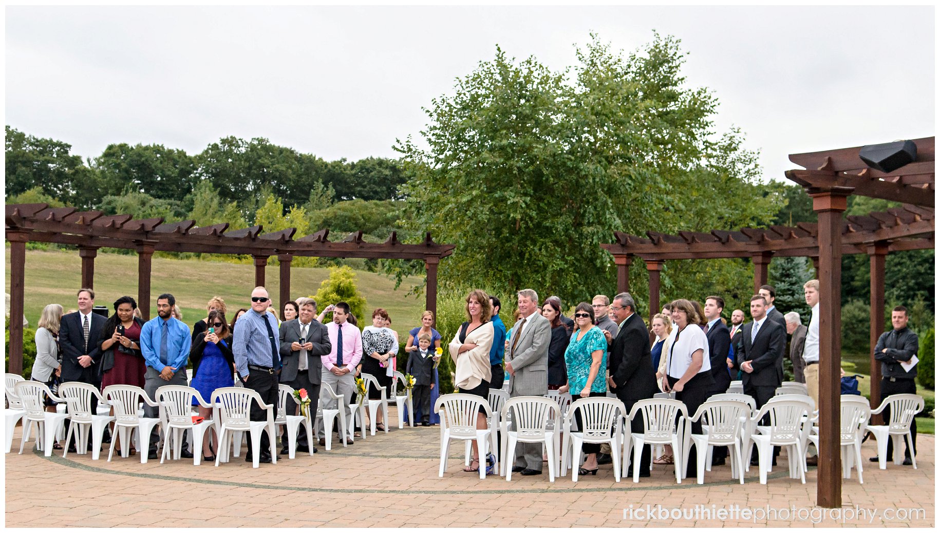 crowd waiting at wedding ceremony on the grand terrace