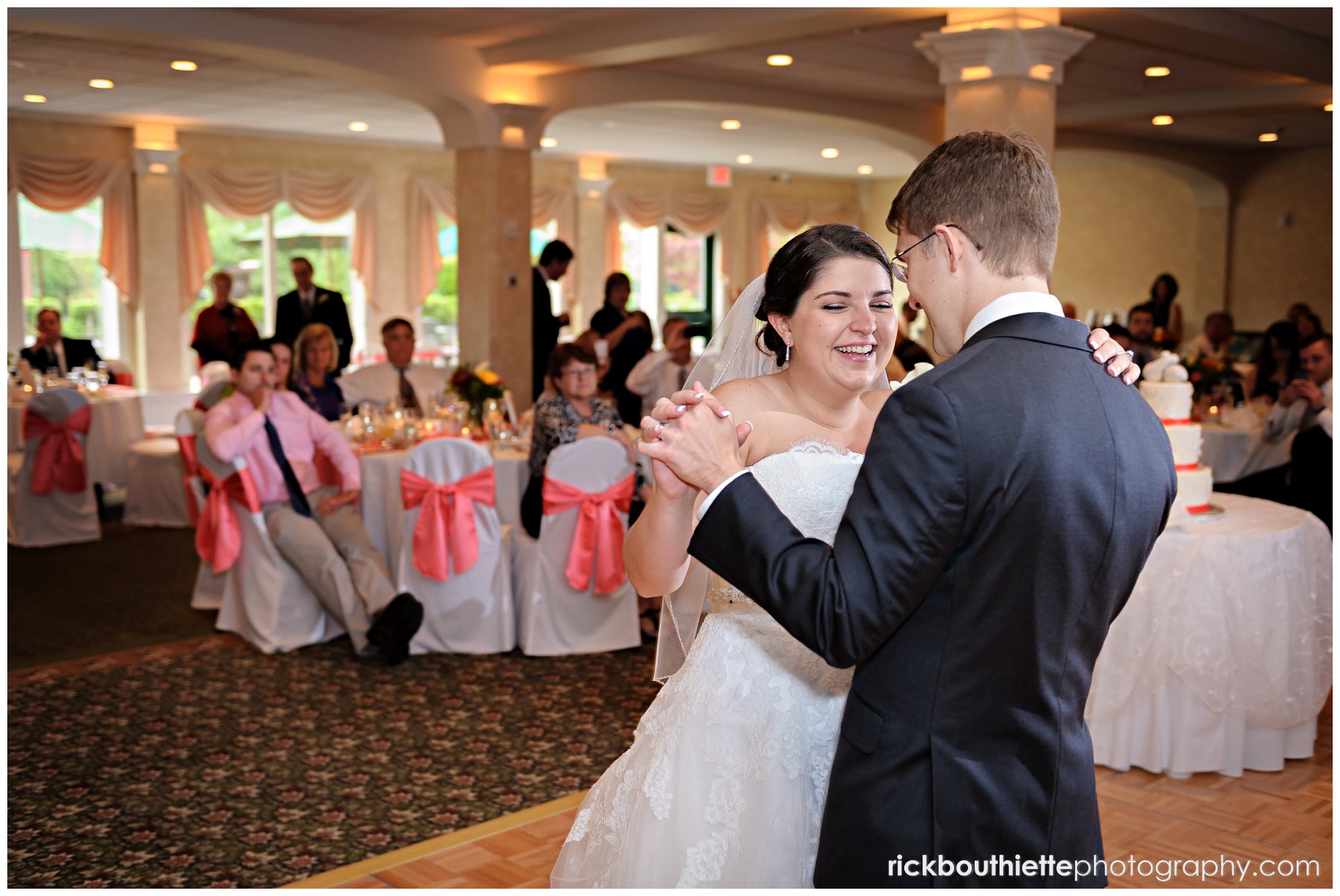 bride & groom during first dance at atkinson country club wedding