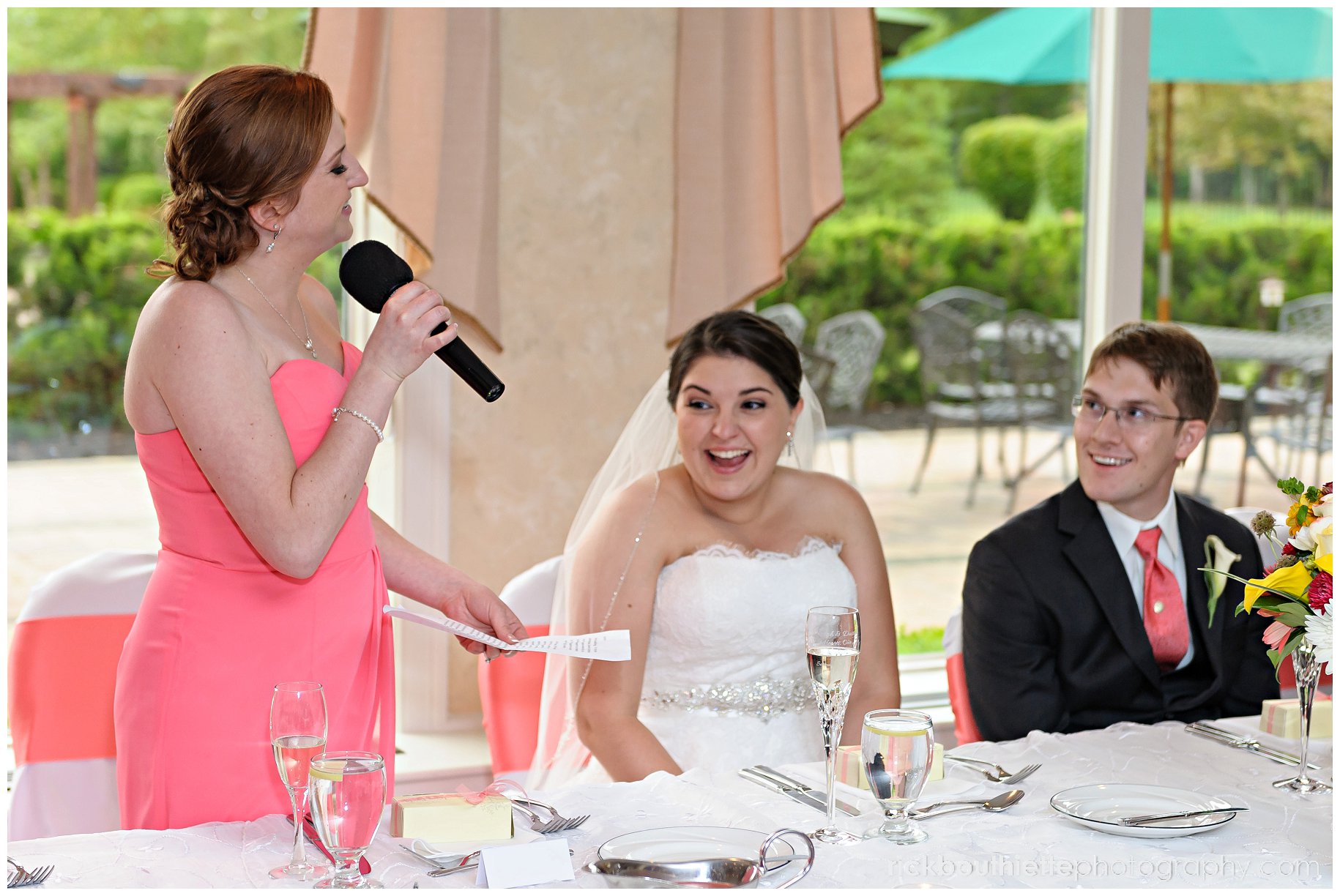 maid of honor toasts bride & groom at wedding