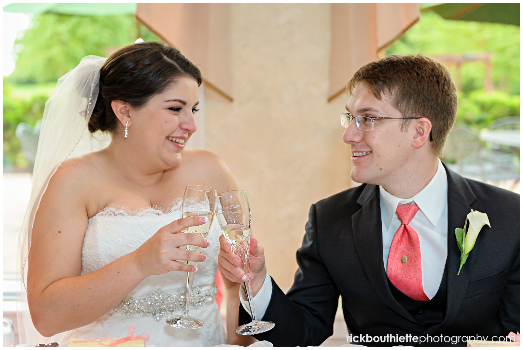 bride & groom toast at wedding