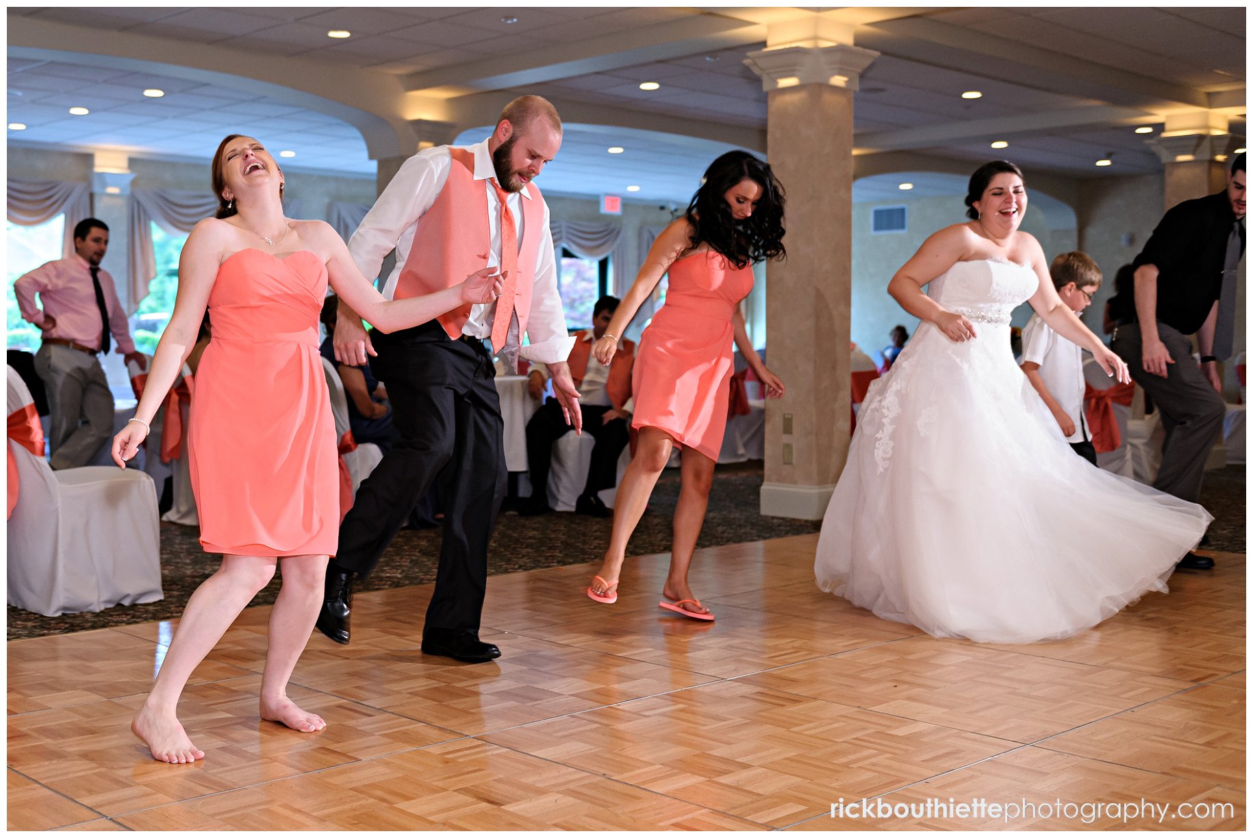 bride & guests dancing at wedding