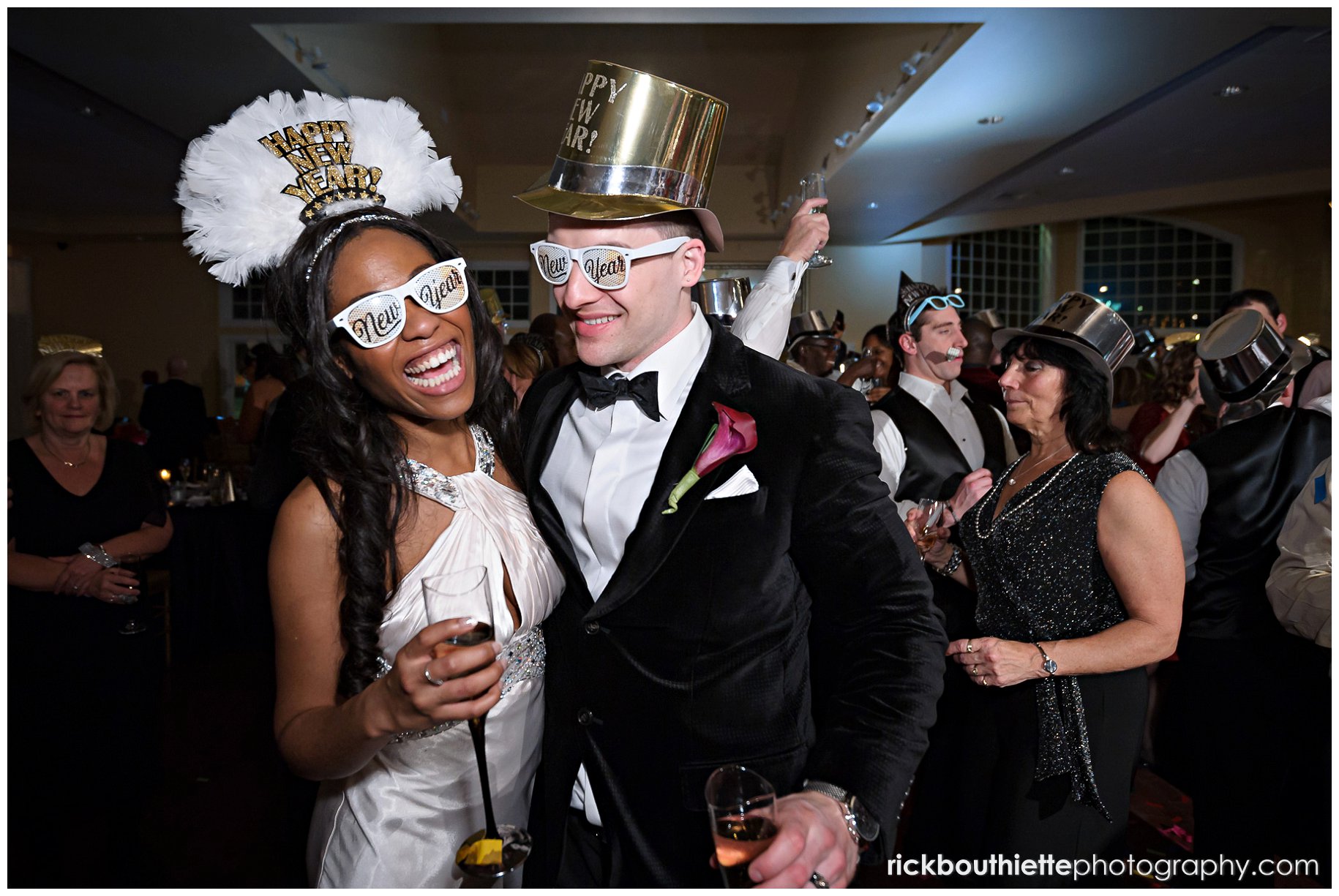 bride and groom celebrate the New Year at Cruiseport Gloucester wedding