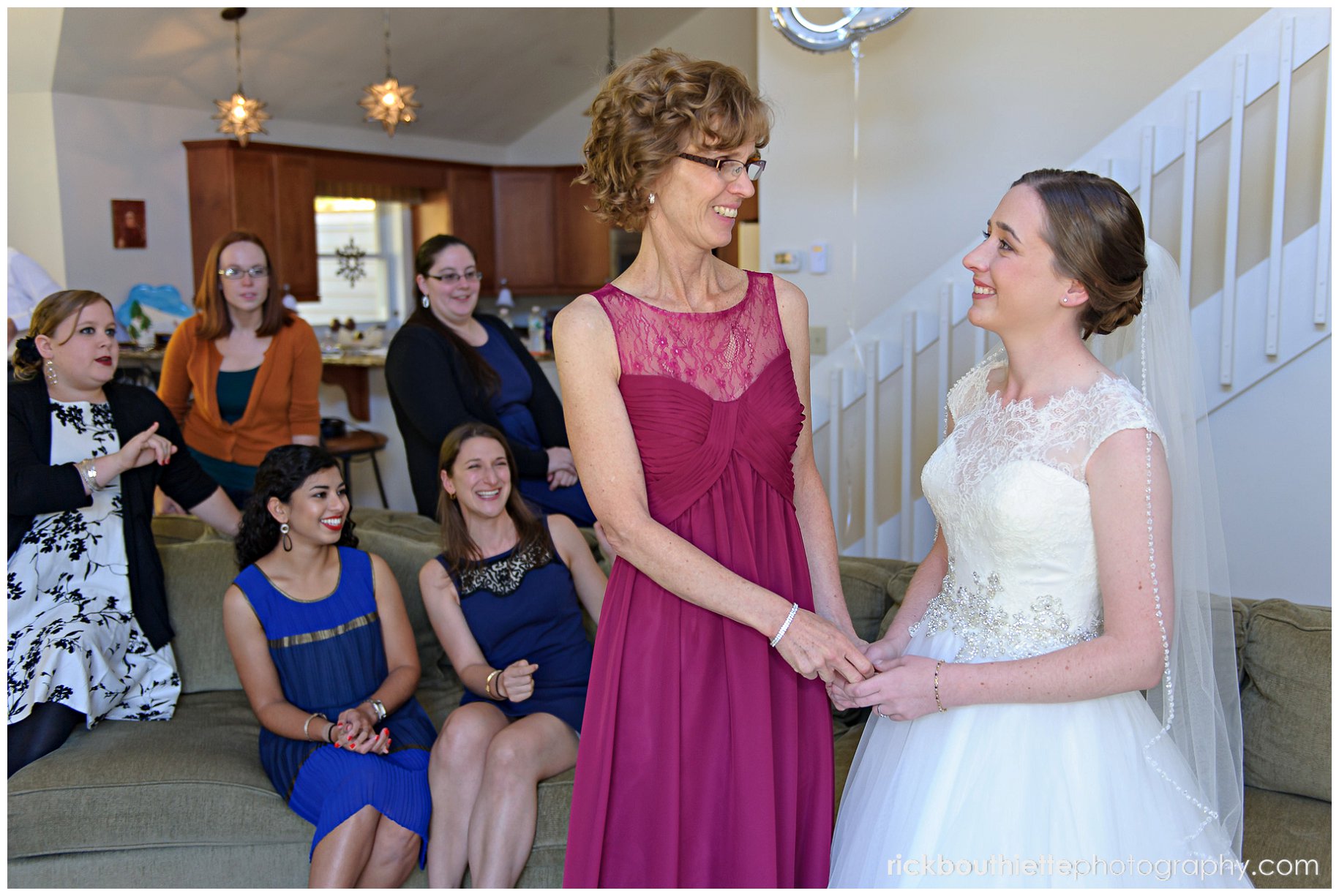 bride and her Mother smiling at each other before Indian Head Resort wedding