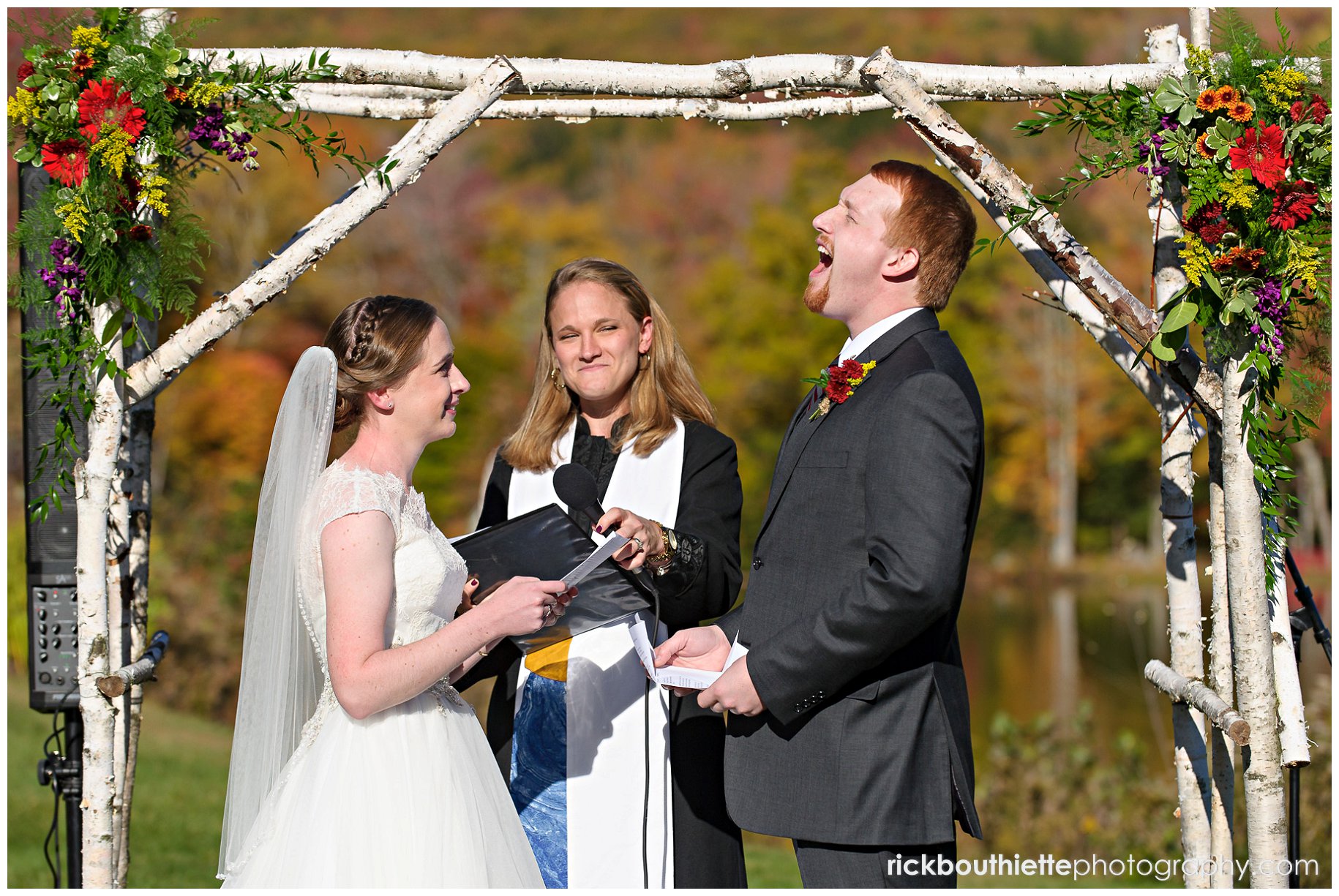 bride and groom laughing during ceremony at Indian Head Resort wedding