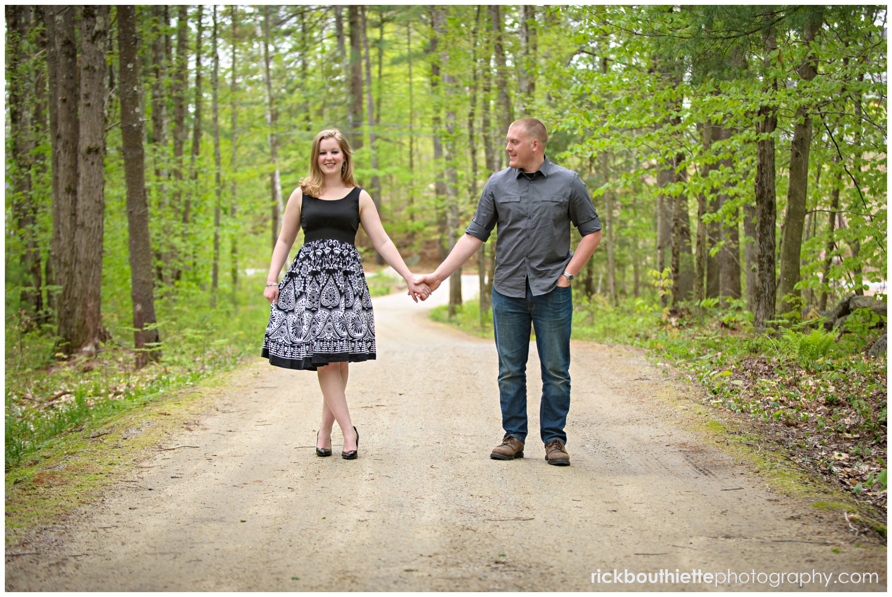 couple standing in dirt road editorial style during NH engagement session