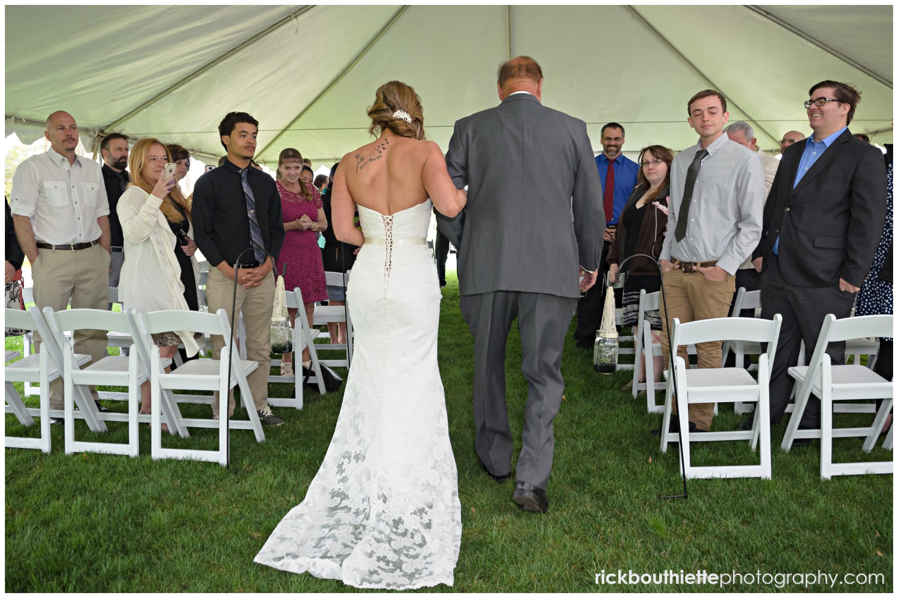 back view of bride wlking down the aisle with her Dad at Grandview Ballroom wedding