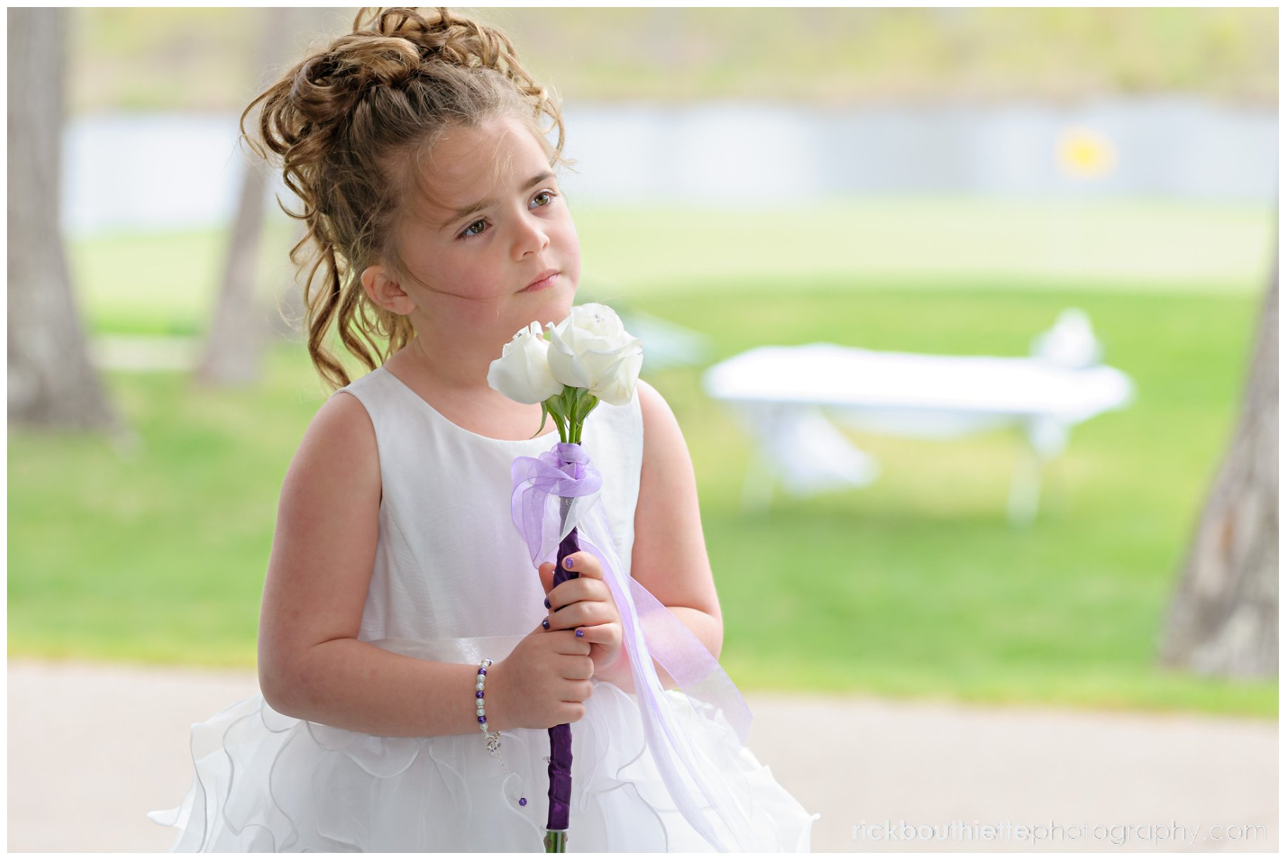 cute flower girl during wedding ceremony at The Oaks Grandview Ballroom