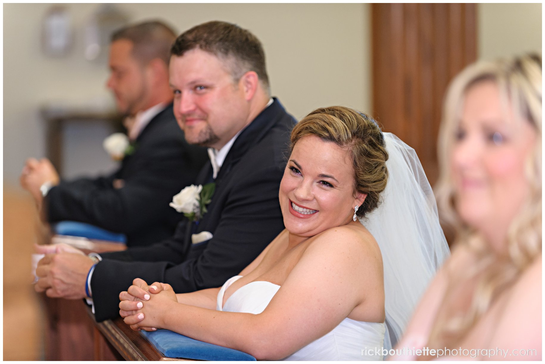 bride & groom smiling on the alter at seacoast NH wedding