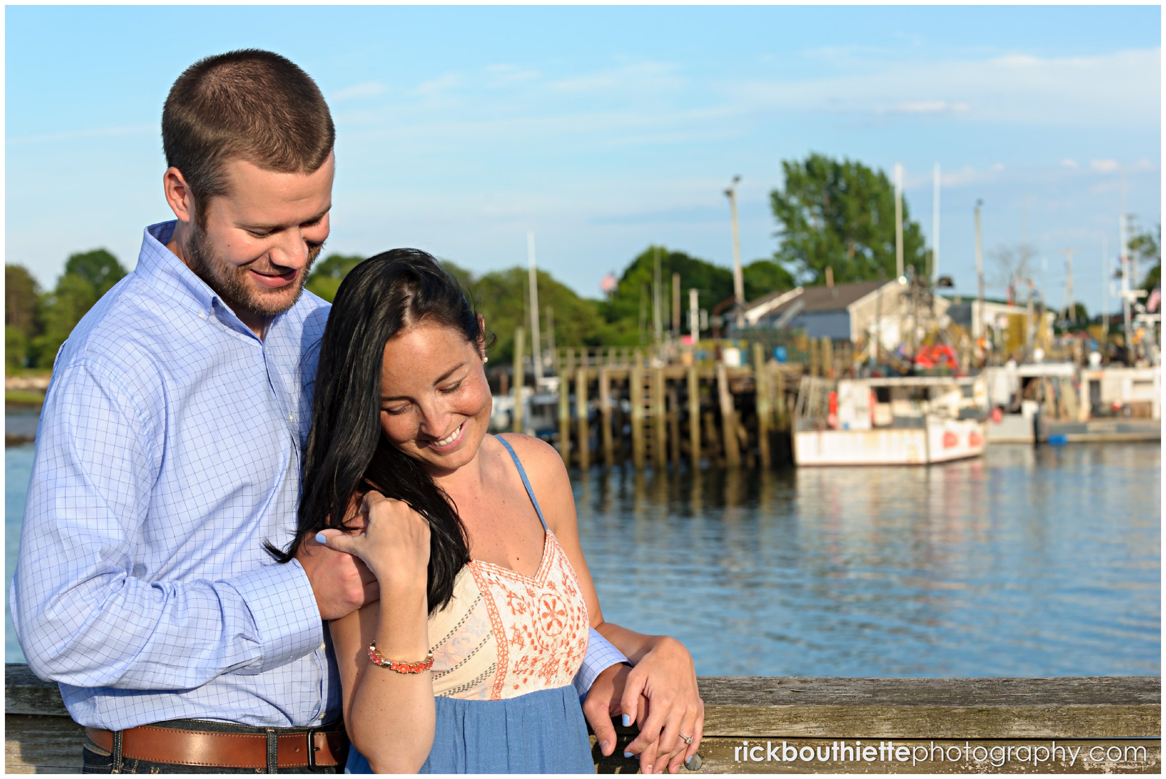 couple sharing romantic moment during seacoast engagement session