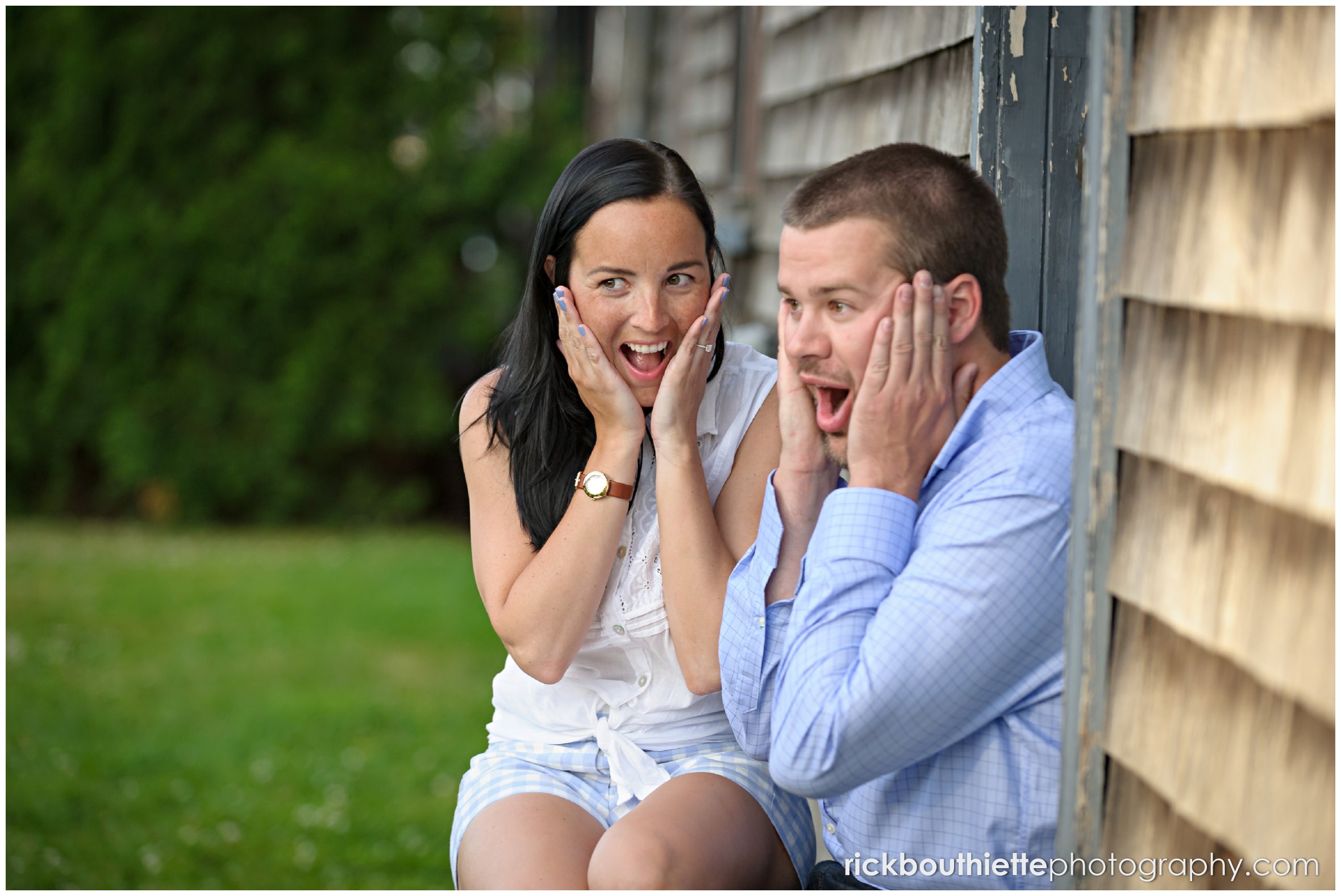 couple sharingfun moment during seacoast engagement session