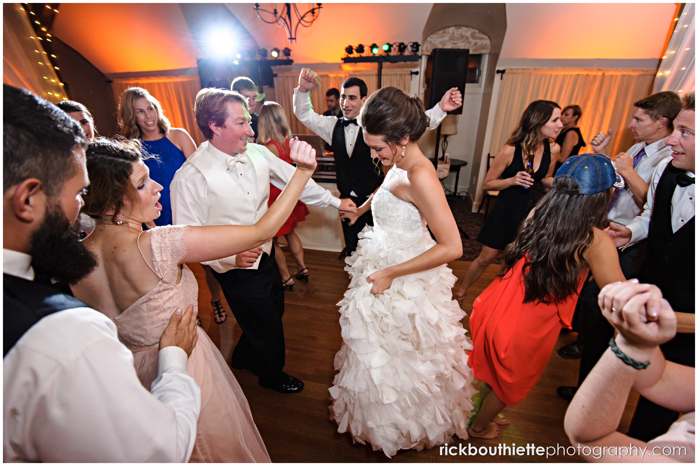 bride and groom dancing at their wedding reception at Castle In The Clouds