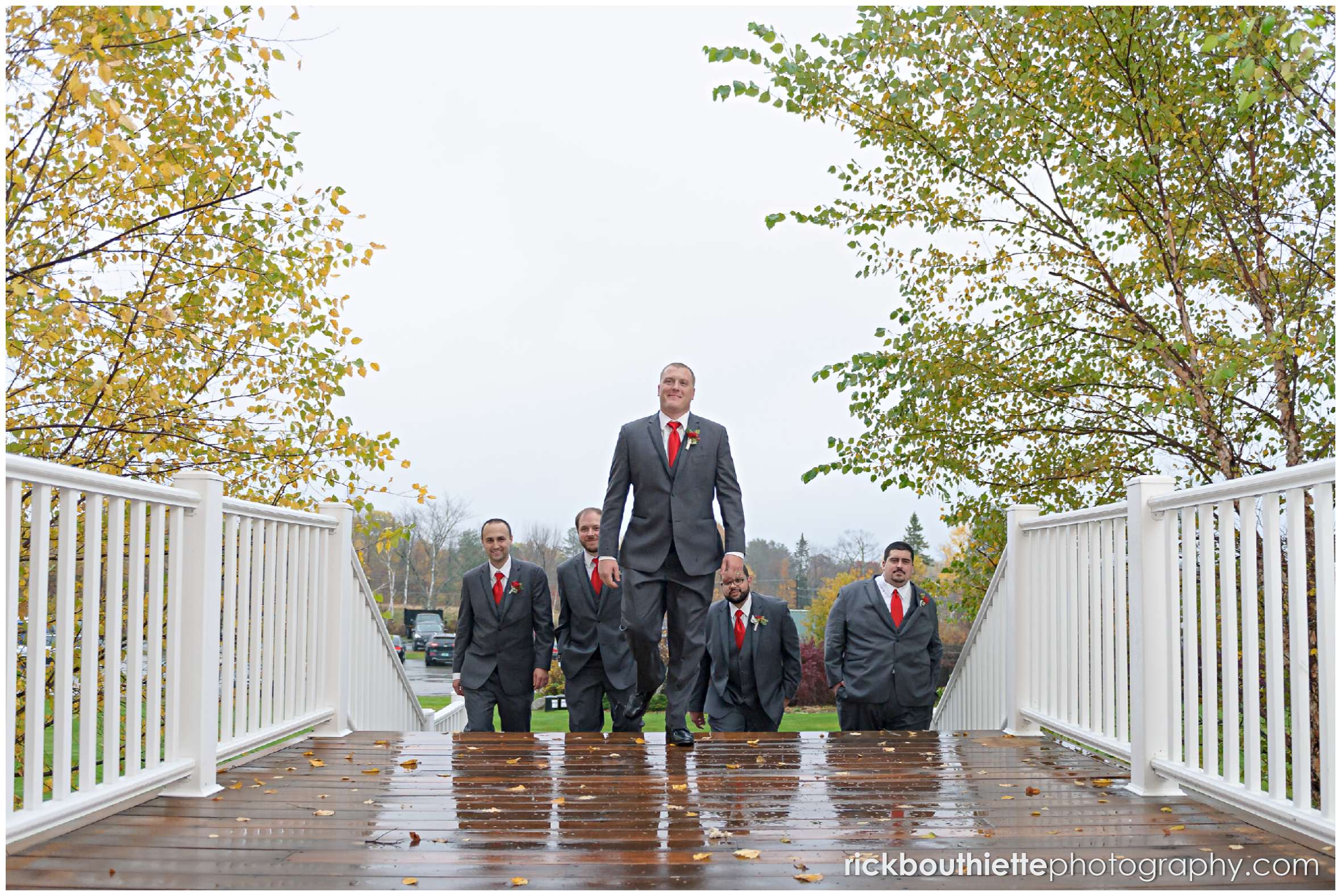 the groom and his groomsmen coming up the stairs at mountain view grand resort