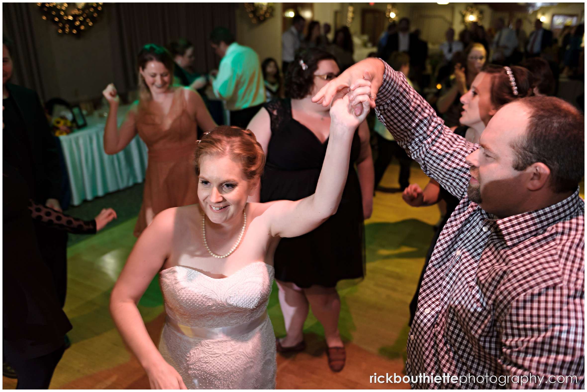 bride dancing with guests at New Hampshire seacoast wedding