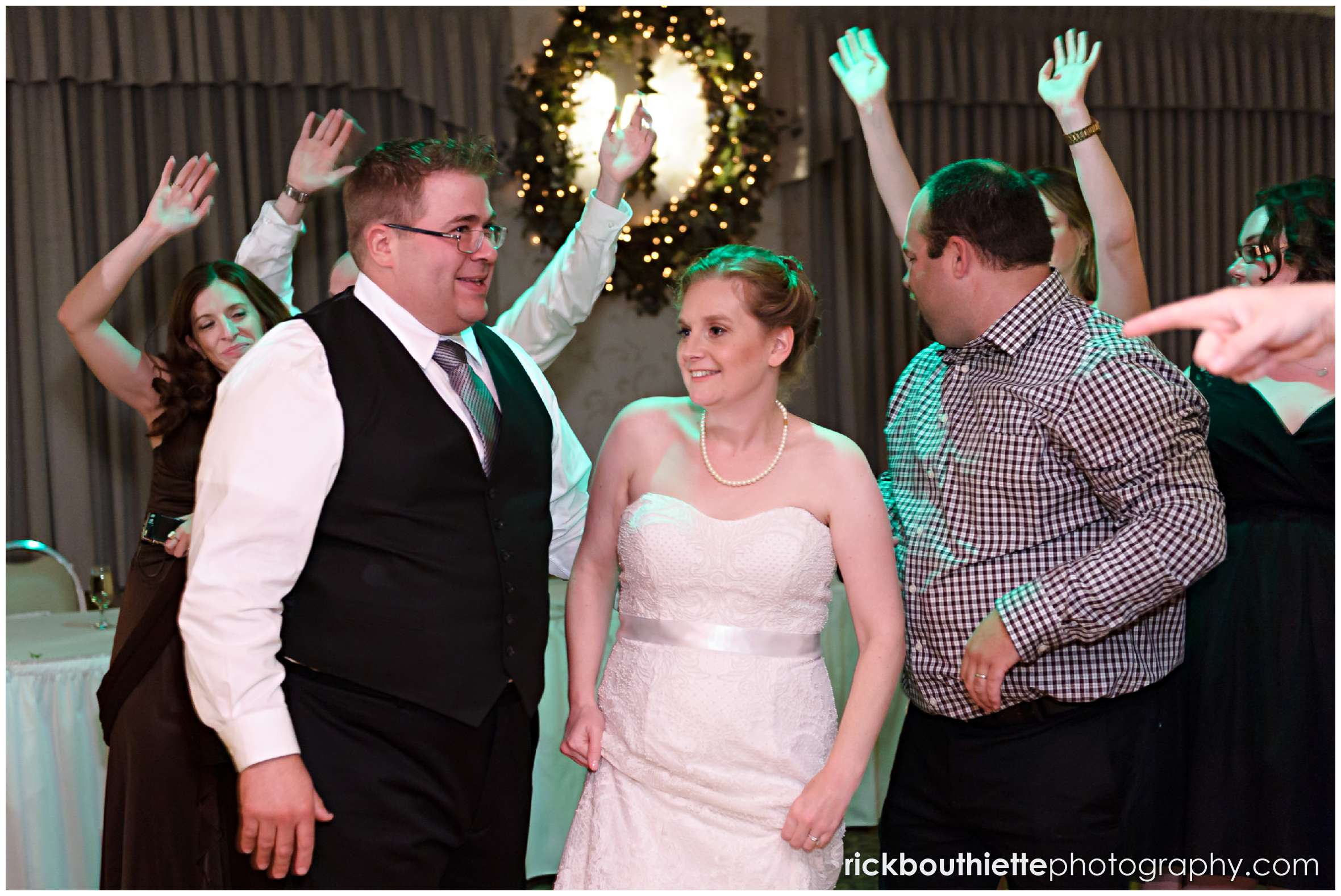 bride and groom dancing with guests at New Hampshire seacoast wedding