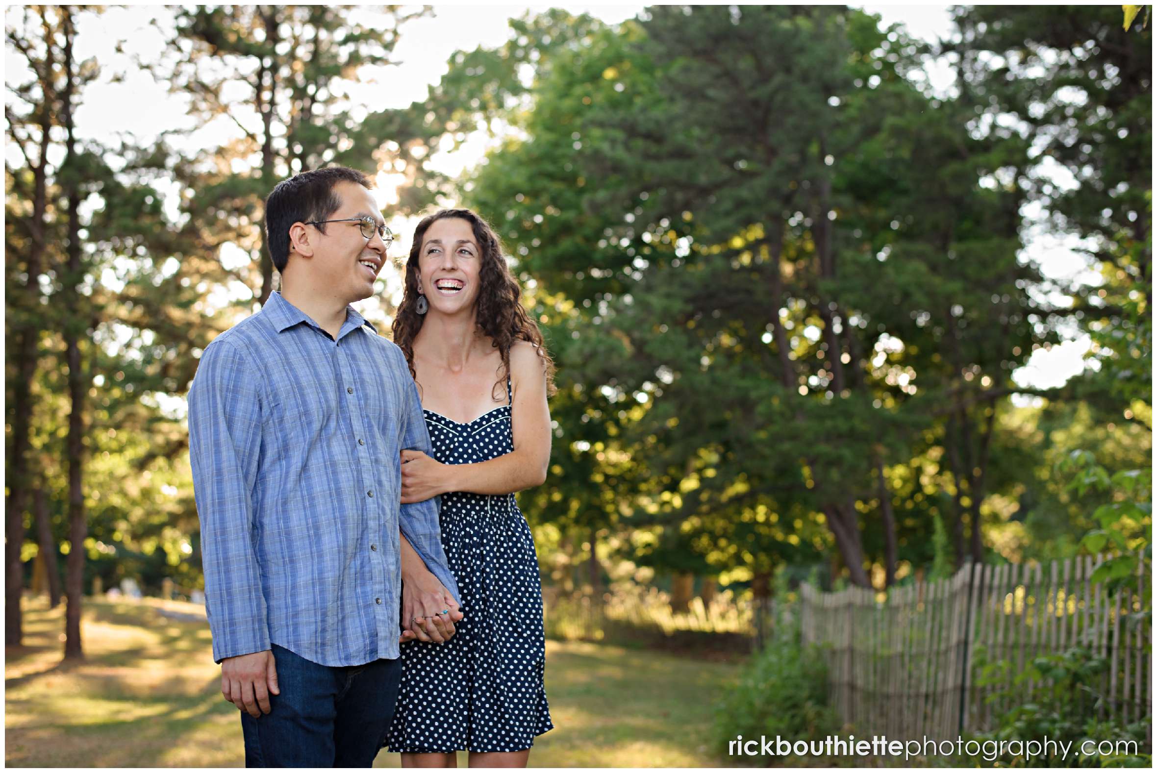 couple walking at Great Island Common in Portsmouth NH during their Great Island Common engagement session