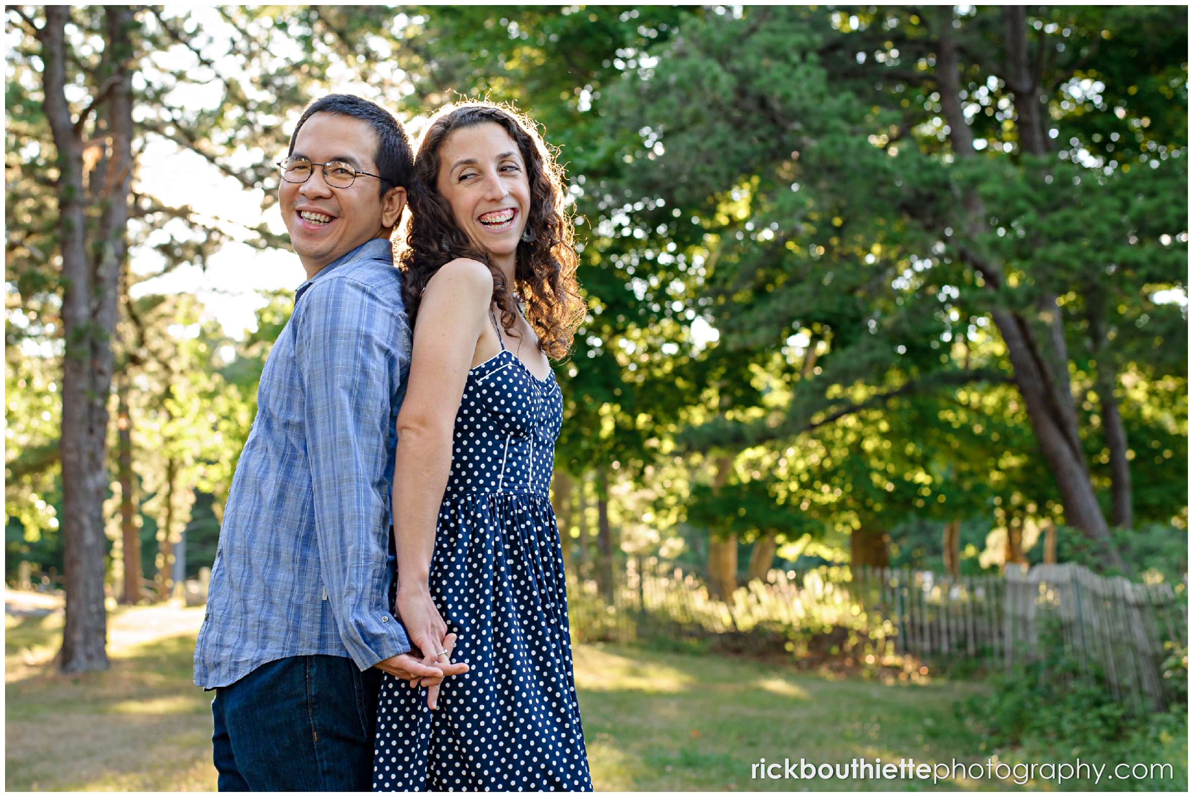 couple having fun at their Great Island Common engagement session on the seacoast