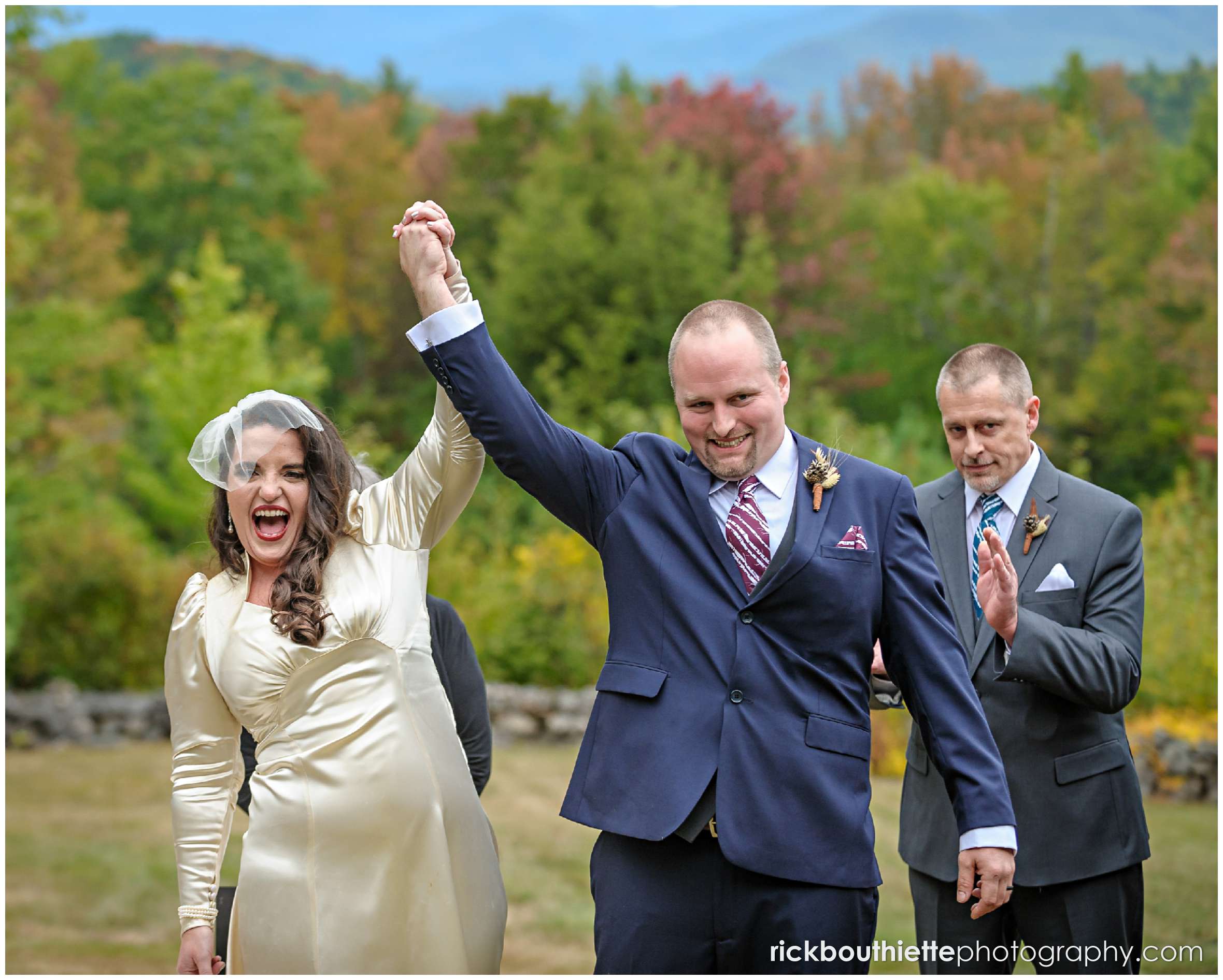 happy bride and groom celebrate as they walk down the aisle after their wedding ceremony