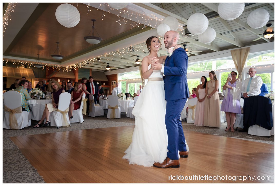 bride and groom having fun dancing at their Candia Woods Evergreen Pavilion wedding