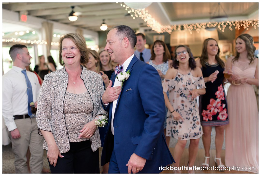 parents of the groom having fun dancing at Candia Woods wedding reception