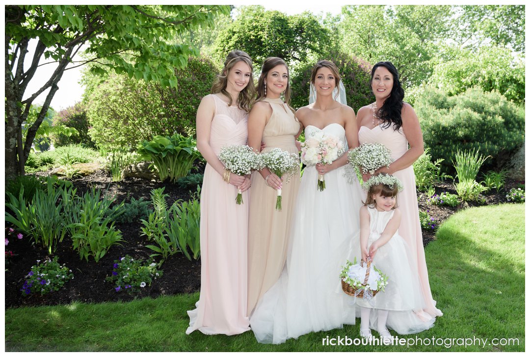 bride with her bridesmaids and flower girl at Candia Woods Evergreen Pavilion wedding